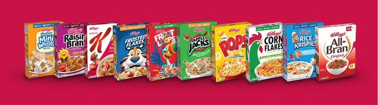 Two sisters laying in the grass talking